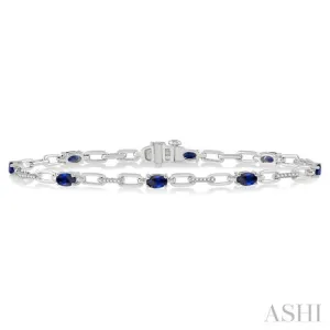 1/6 Ctw Round Cut Diamond & 5x3MM Oval Cut Sapphire Precious Bracelet in 10K White Gold