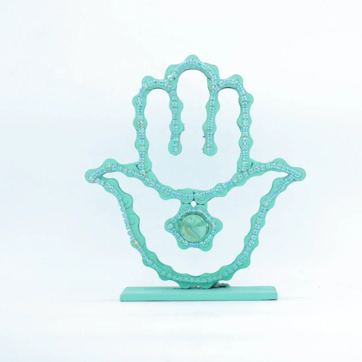 On A Stand Shimmering Hamsa Sculpture