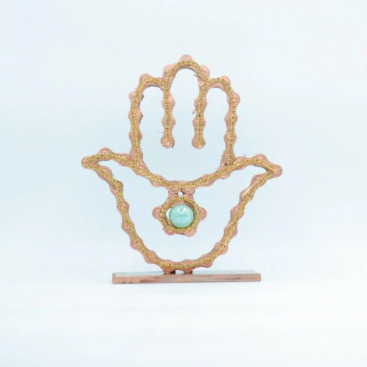 On A Stand Shimmering Hamsa Sculpture