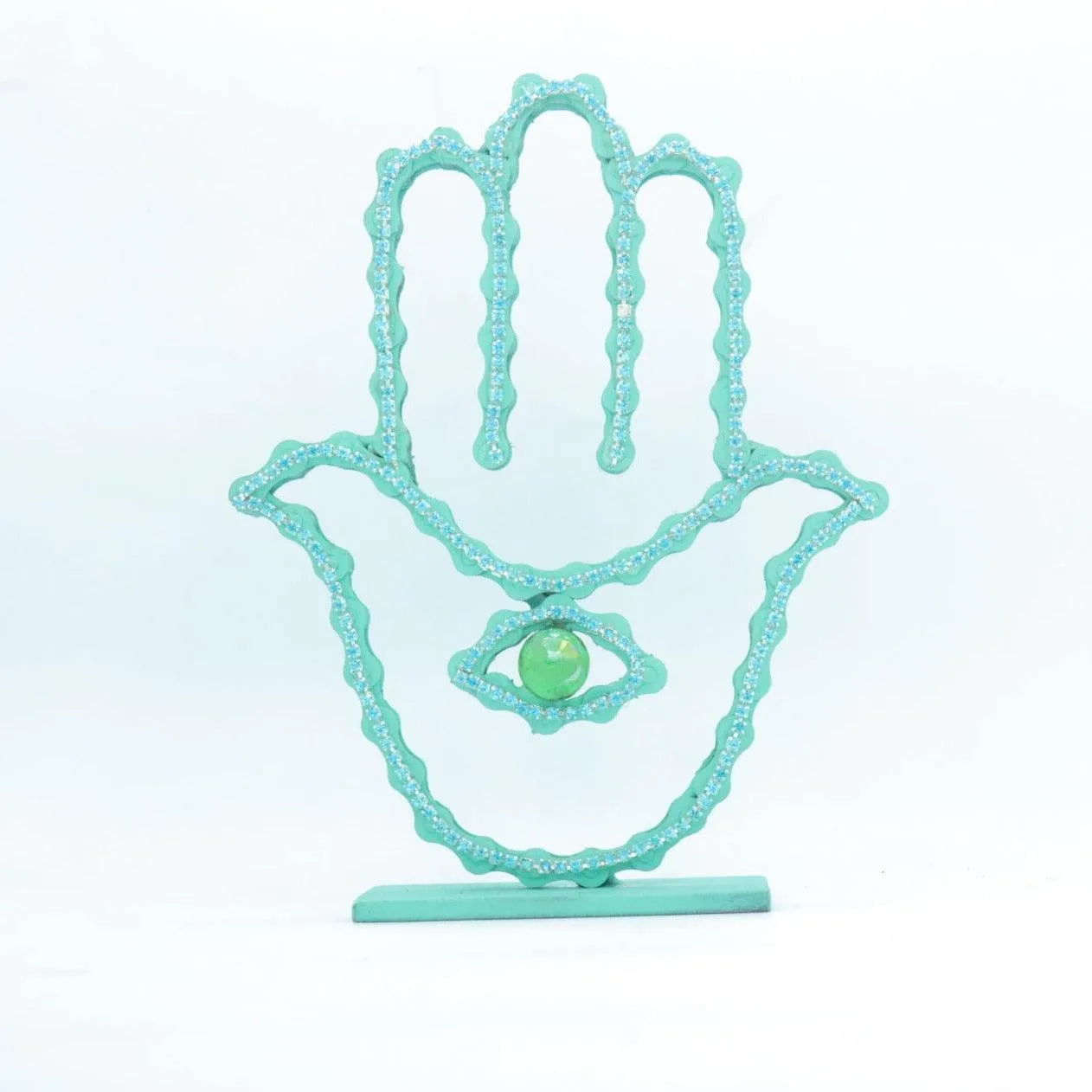 On A Stand Shimmering Hamsa Sculpture