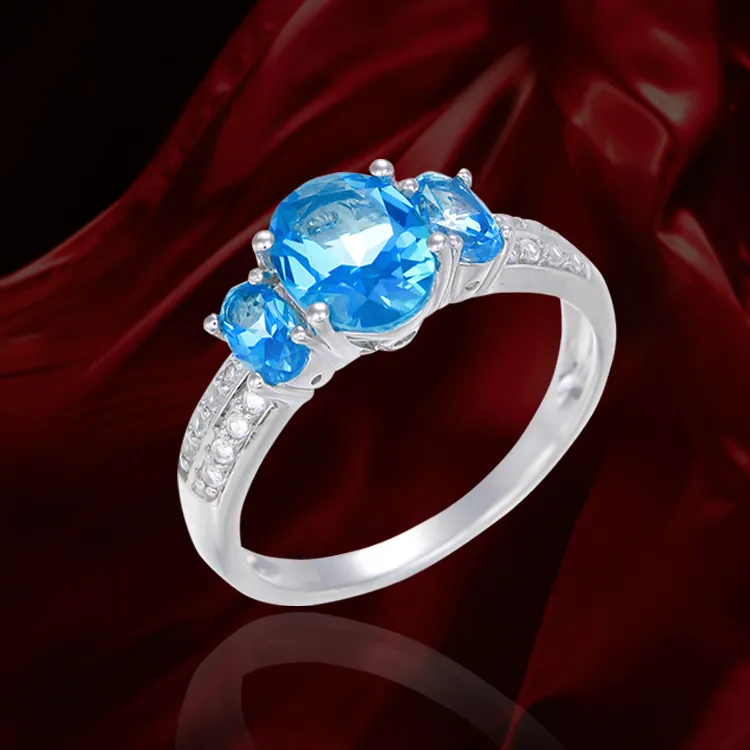 Trilogy Ring with Passion Topaz and Natural White Topaz